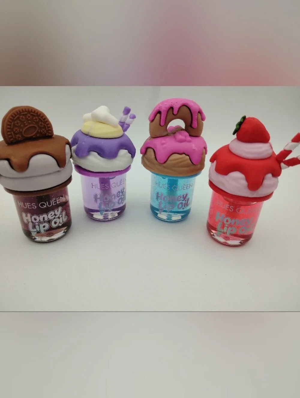 Honey Lip Oil With A Cookie, Donut, Strawberry, & Milkshake Top